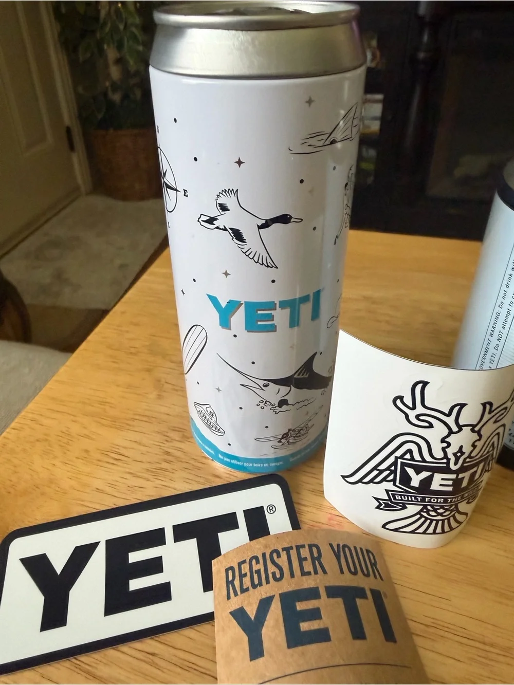 Yeti Blue & White Slim Can Cooler with Sticker Card